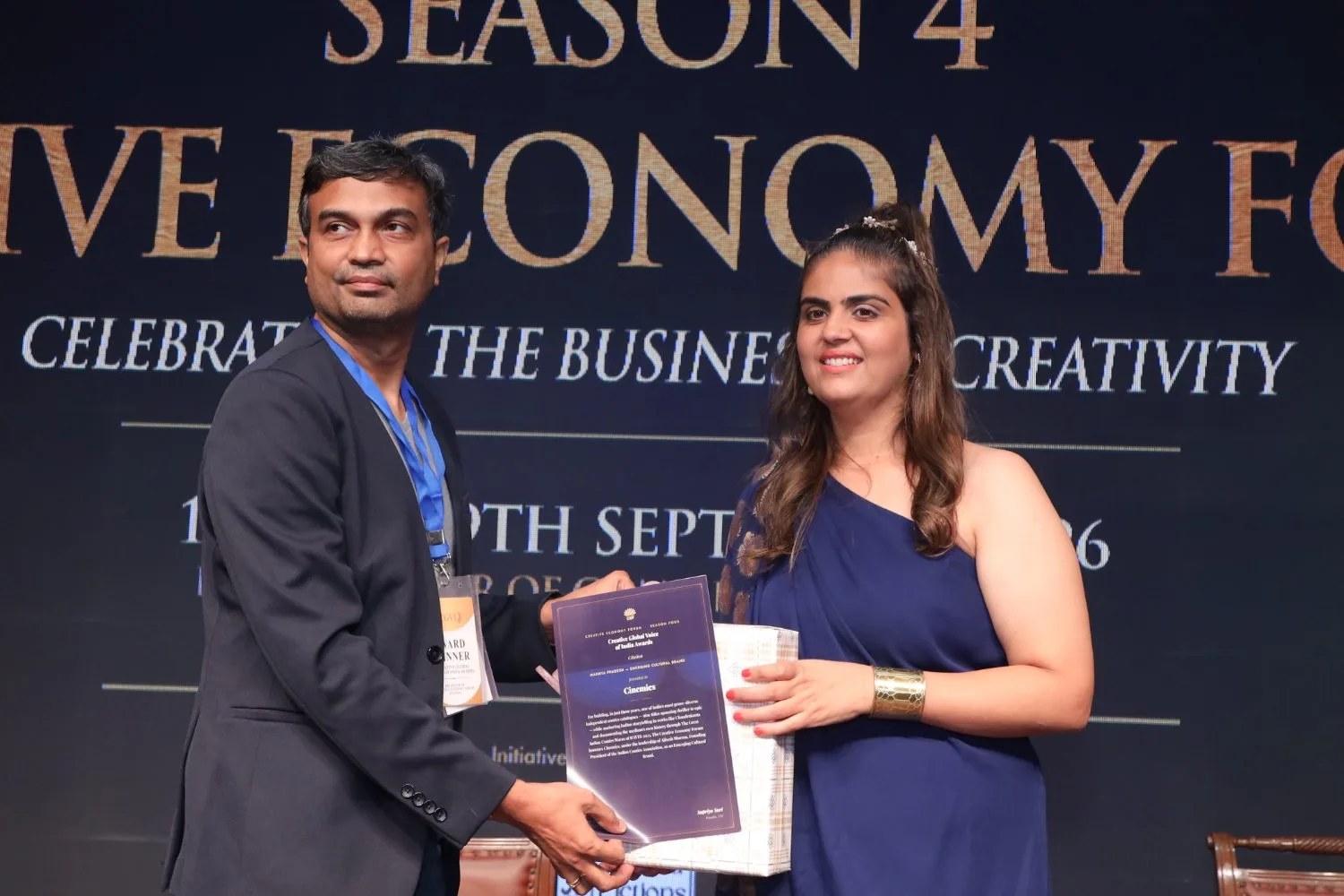 Ajitesh Sharma receives an award on stage at Creative Economy Forum Season 4